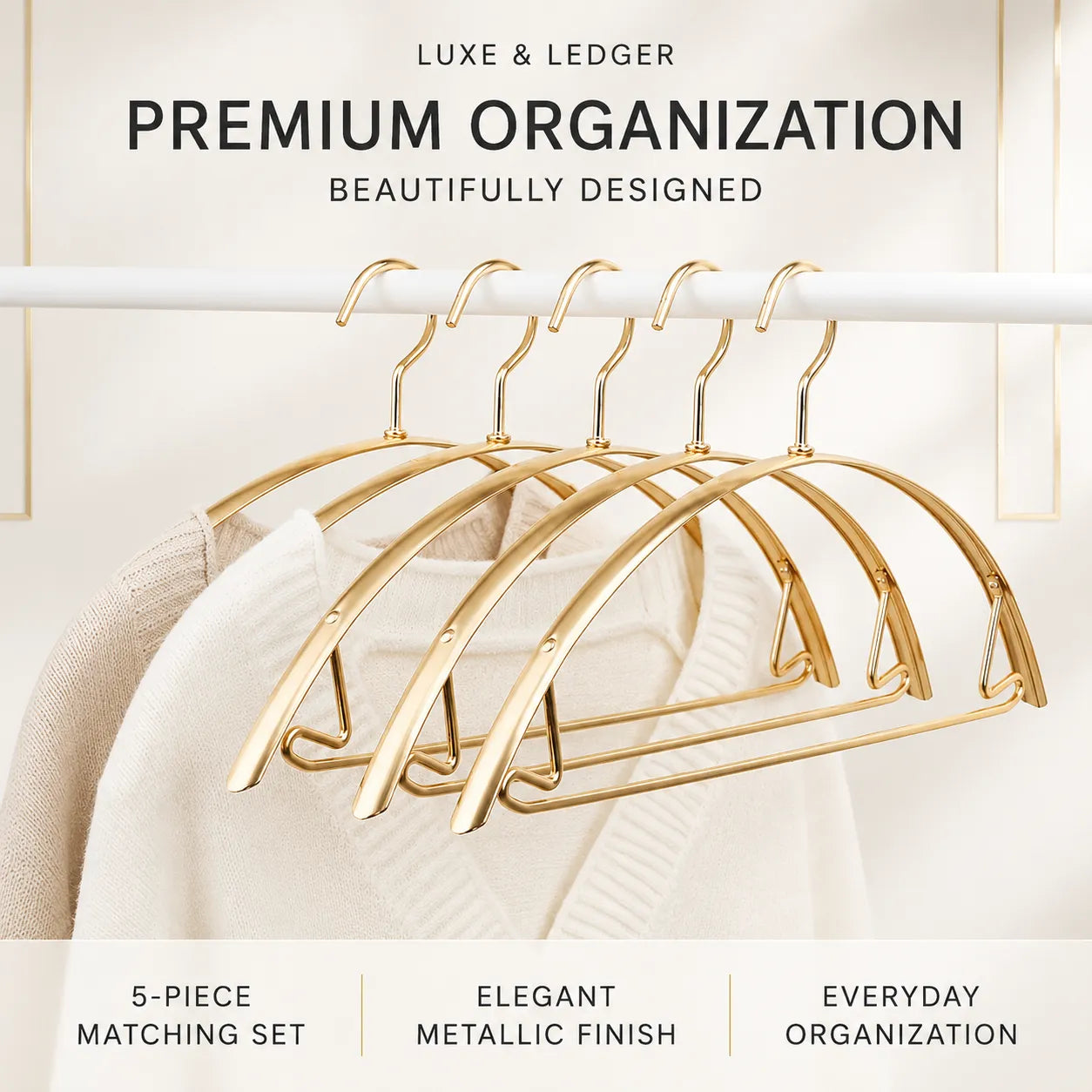 Five gold-tone metal hangers arranged on a white clothing rack, with a cream knit sweater draped over them. Text at the top reads 'LUXE & LEDGER PREMIUM ORGANIZATION' and text at the bottom highlights a 5-piece matching set, elegant metallic finish, and everyday organization.