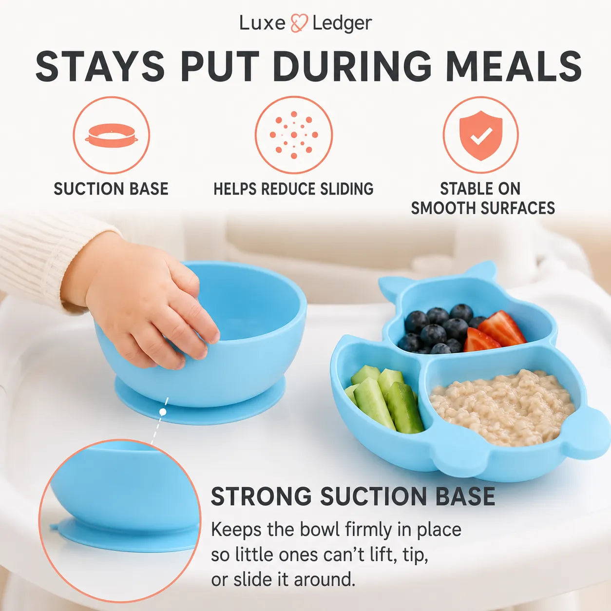 A light blue silicone suction-based baby bowl shown on a white tray, with a child's hand resting inside the bowl. The image includes marketing text and icons highlighting features like suction base, reduced sliding, and stability on smooth surfaces, plus a close-up inset of the suction base.
