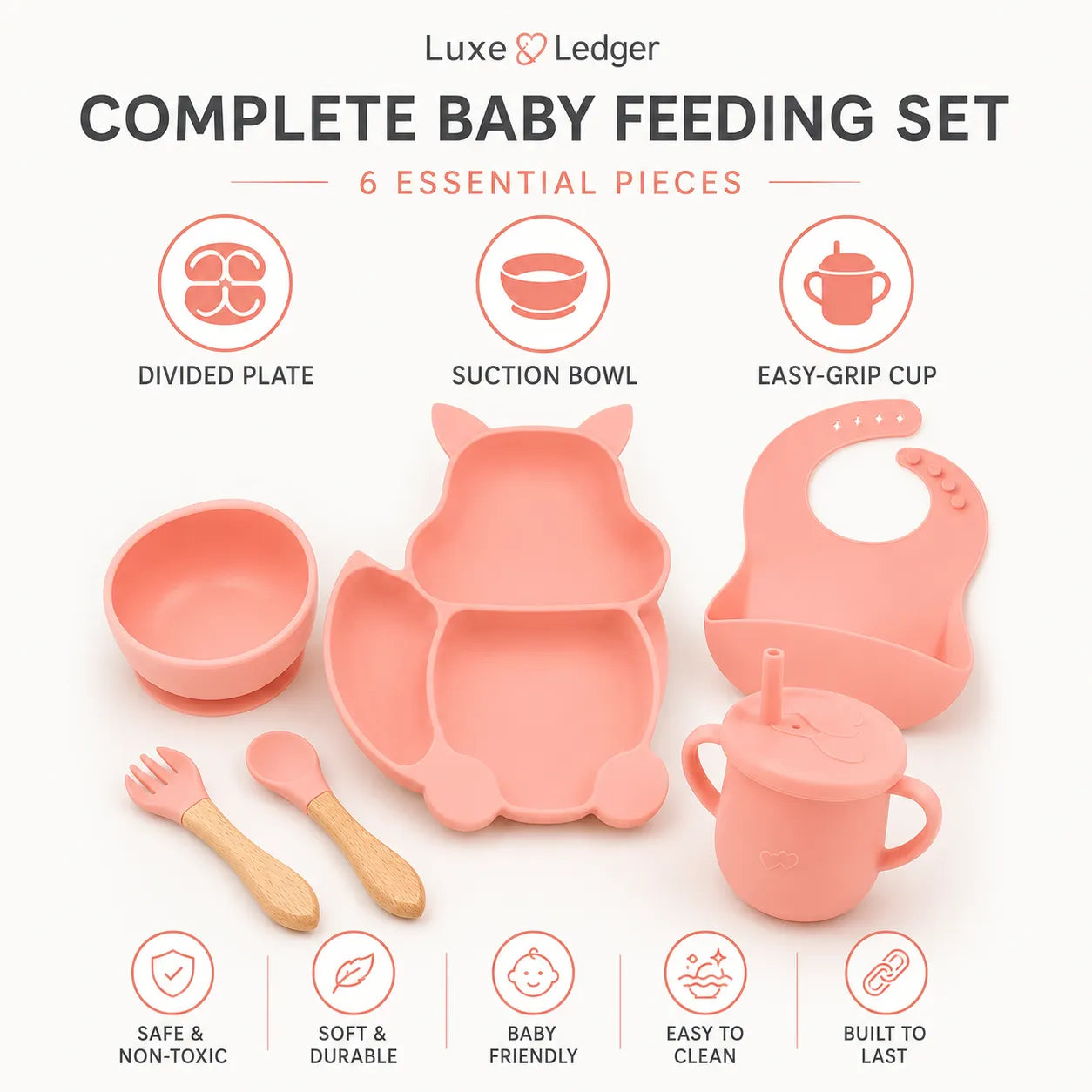Luxe Ledger Complete Baby Feeding Set in a soft coral pink color, featuring a divided plate, suction bowl, easy-grip cup, bib, and two wooden-handled utensils, displayed on a clean off-white background with feature icons.
