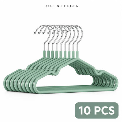 Ten mint green metal hangers with silver hooks, arranged in a fan shape on a white background, with 'LUXE & LEDGER' text at the top and a '10 PCS' badge at the bottom right.
