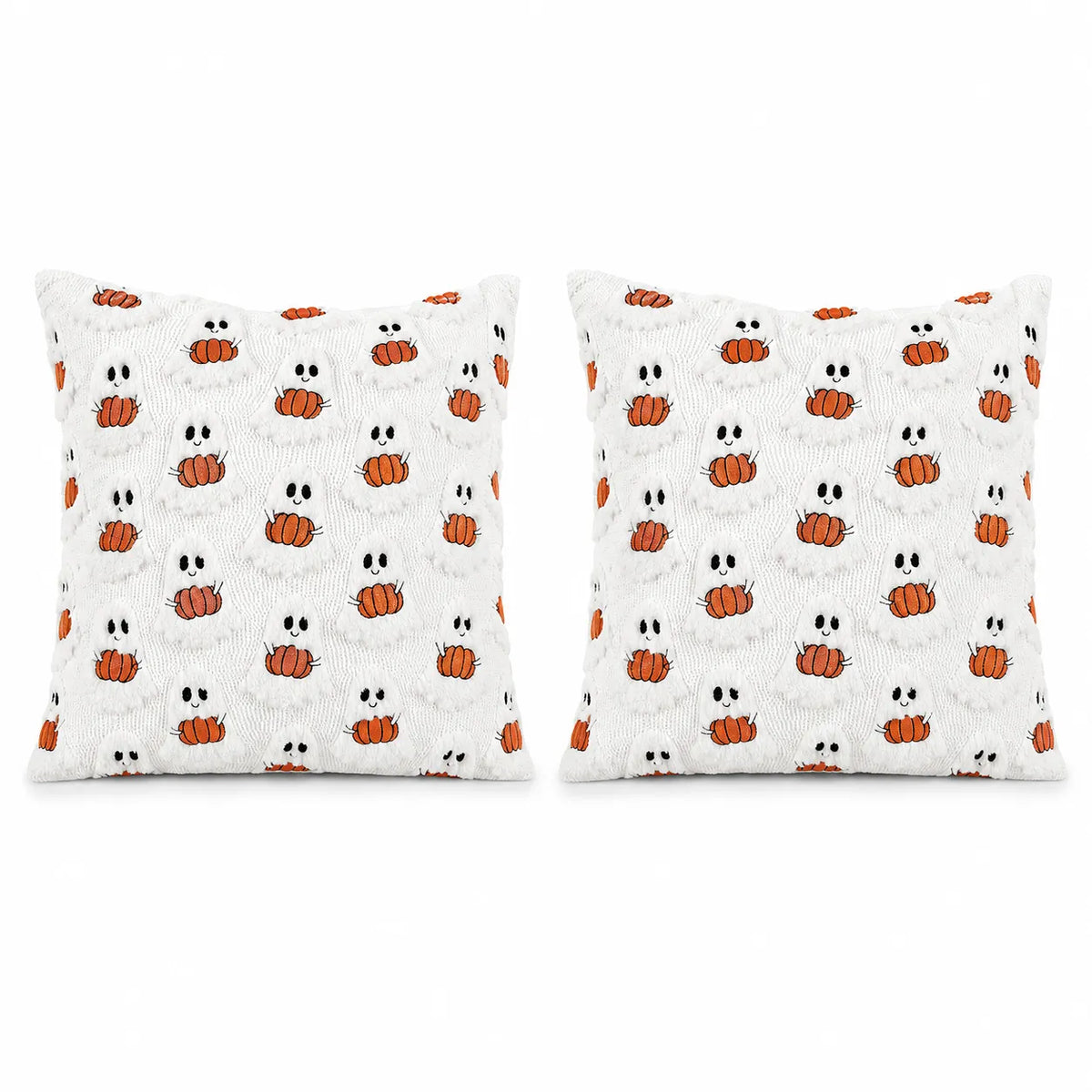Two square white throw pillows with a repeating Halloween pattern of orange pumpkins and white ghosts, shown side by side on a plain white background.