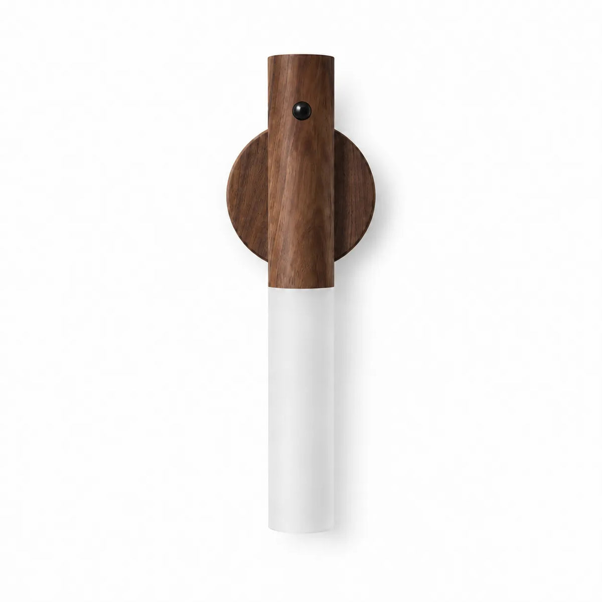 A modern wall-mounted light fixture with a dark brown wood circular backplate, a matching vertical wood upper section with a small black accent, and a frosted white cylindrical lower shade, shown against a plain white background.