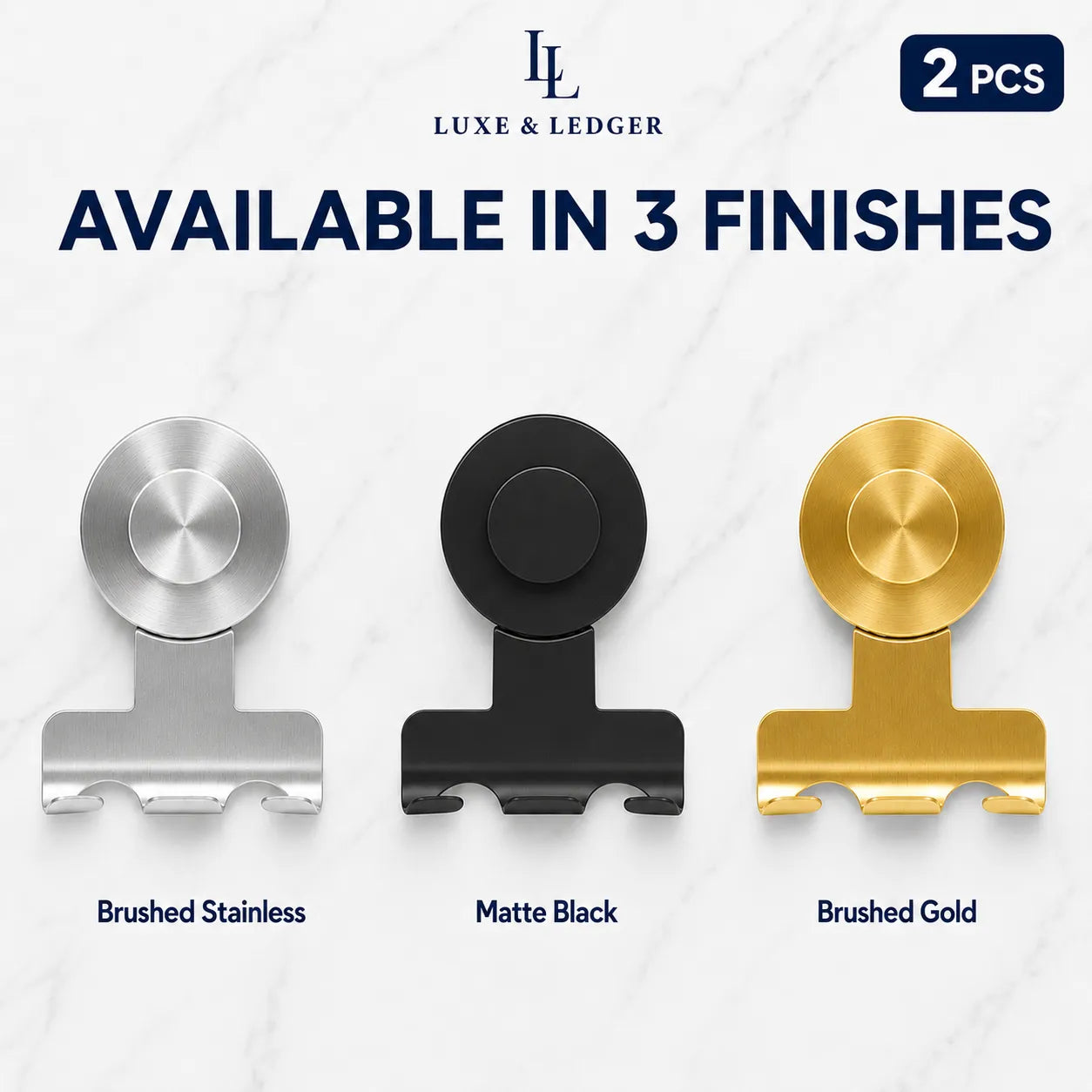 Three metal clip-style accessories shown on a light marble background, labeled Brushed Stainless, Matte Black, and Brushed Gold, with Luxe & Ledger branding and a '2 PCS' badge.
