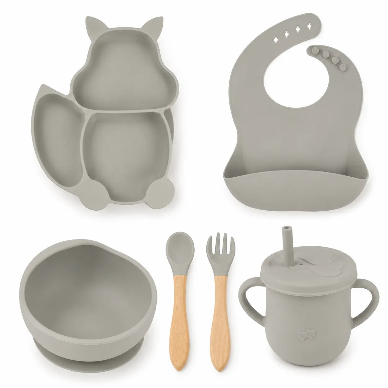 A baby feeding set in a uniform light gray silicone material, featuring a cat-shaped divided plate, a matching silicone bib, a bowl with a suction base, a lidded sippy cup with a straw, and a wooden spoon and fork.