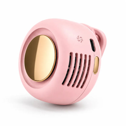 Pink and gold portable speaker on a white background