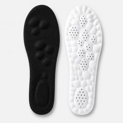 Black and white shoe insoles on a light gray background