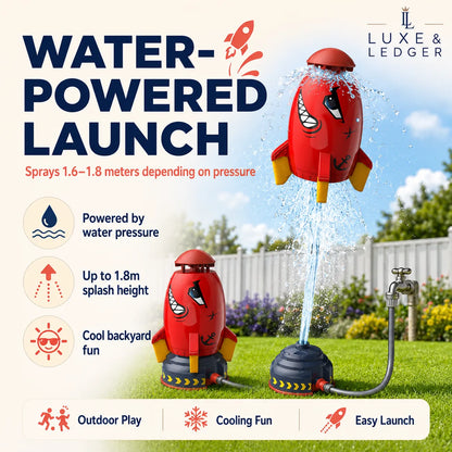 Red rocket-shaped water launcher with hose, spraying water in a garden setting, branded 'Luxe & Ledger'.