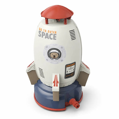 Toy rocket ship with 'Go to Outer Space' text on a white background