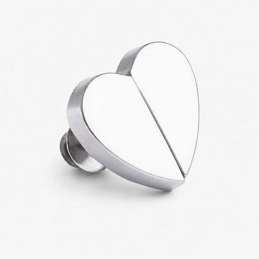Silver ring with a unique design on a white background