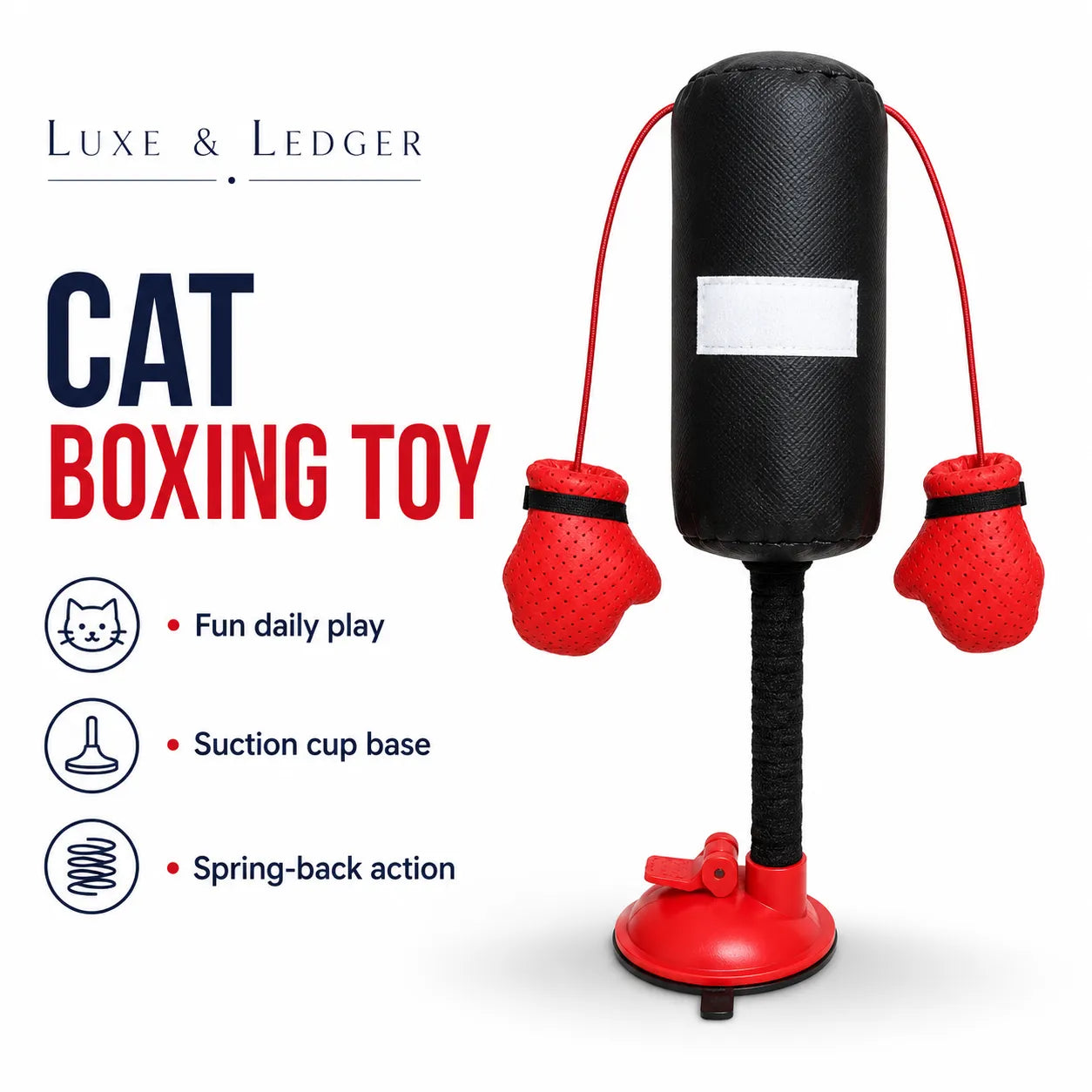 Cat boxing toy with red gloves and black punching bag on a white background, featuring Luxe & Ledger branding.