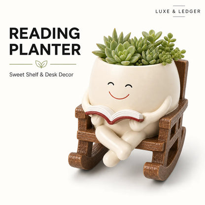 Reading planter with a smiling face holding a book, sitting on a wooden chair, on a white background.