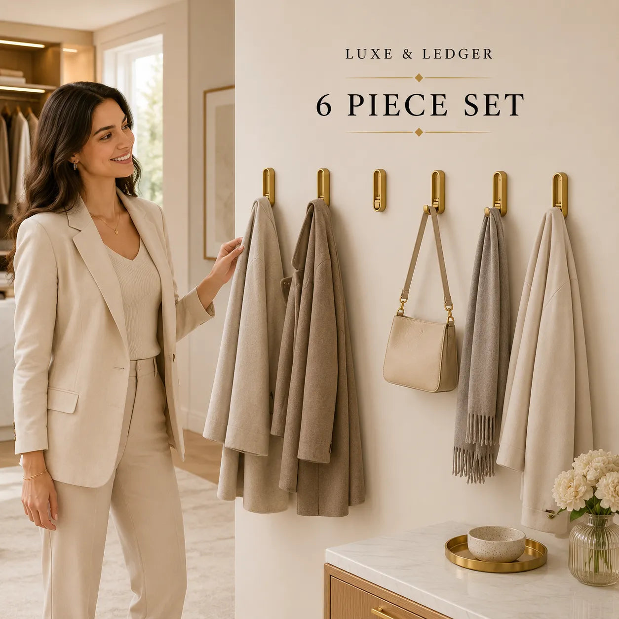 Woman in a beige suit standing next to a wall with a 6-piece set of clothing and bags displayed.