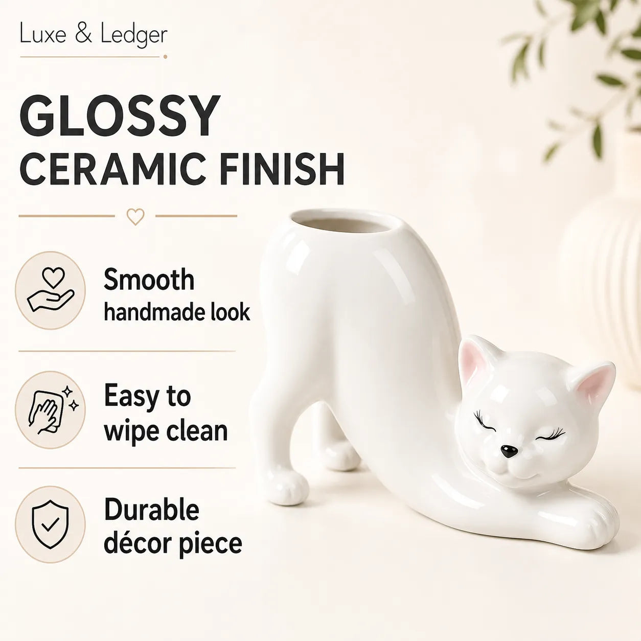 White ceramic cat-shaped planter with text highlighting features on a light background