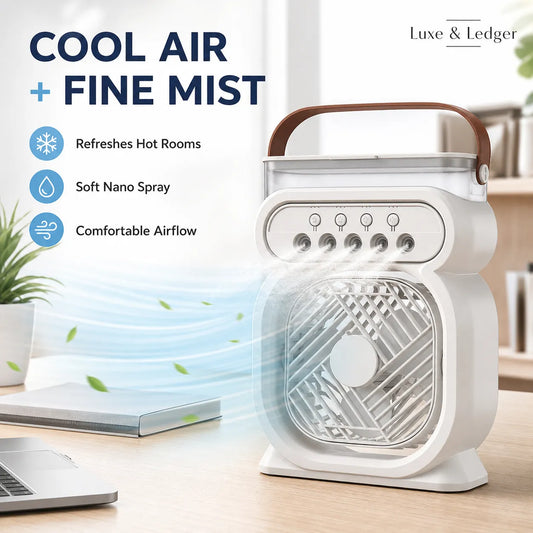 Portable air cooler with fine mist feature on a desk with laptop and plant.