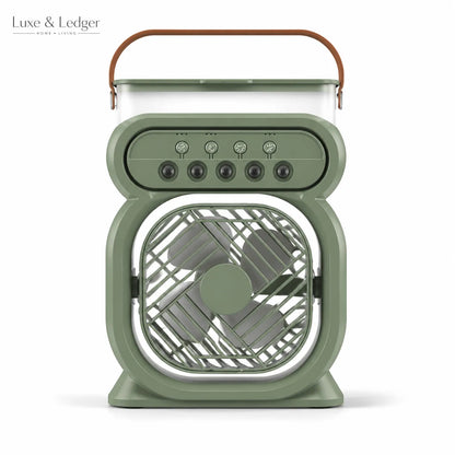 Green portable fan with brown handle on a white background, branded 'Luxe & Ledger'.