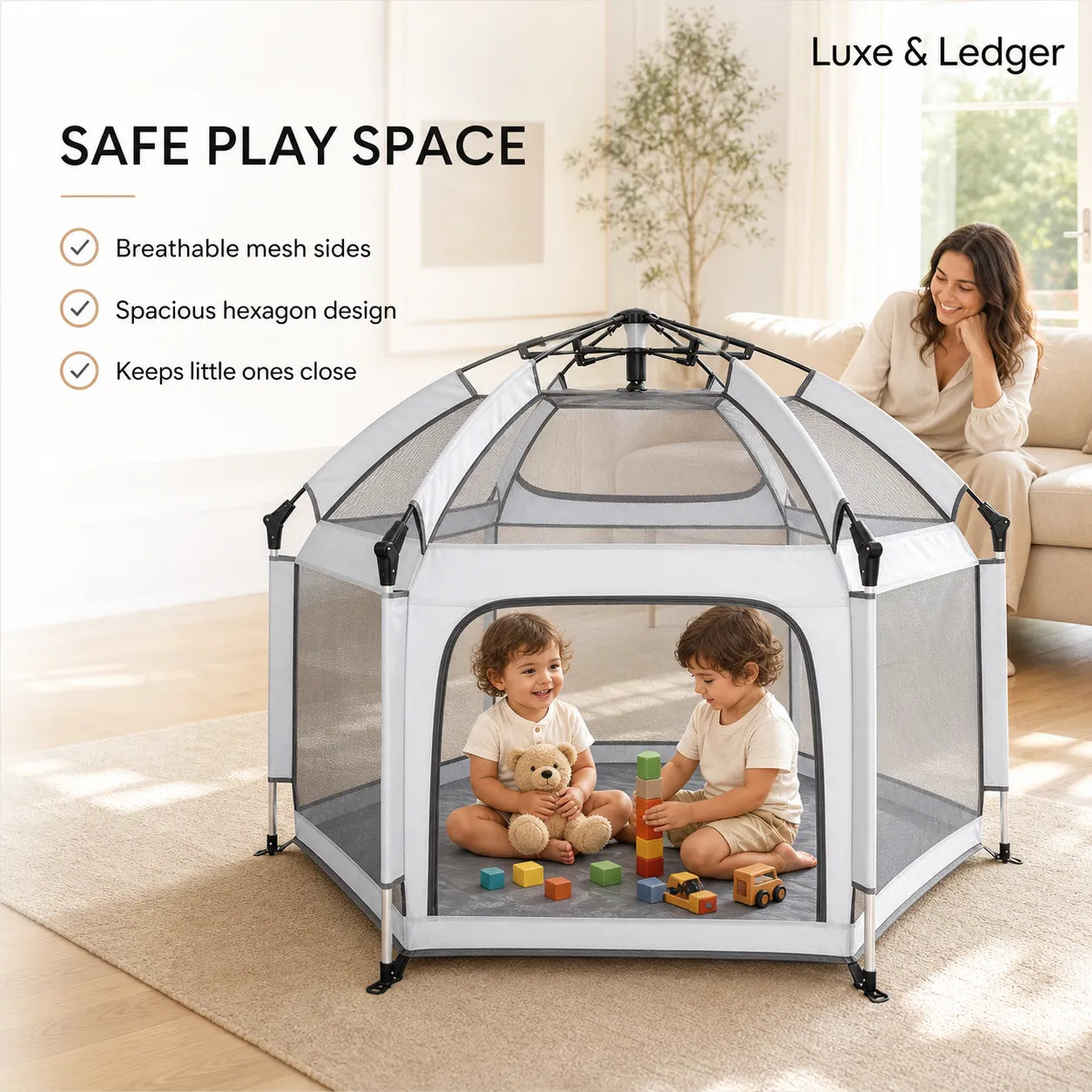 Children playing inside a hexagonal playpen with a woman sitting on a couch in the background.