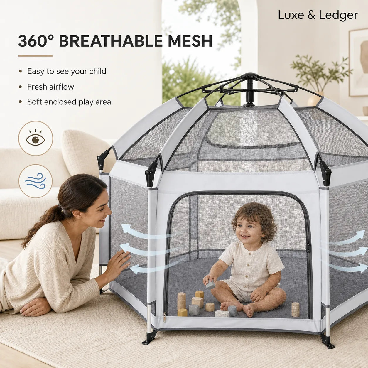 Child playing inside a soft enclosed play area with breathable mesh, surrounded by a woman.