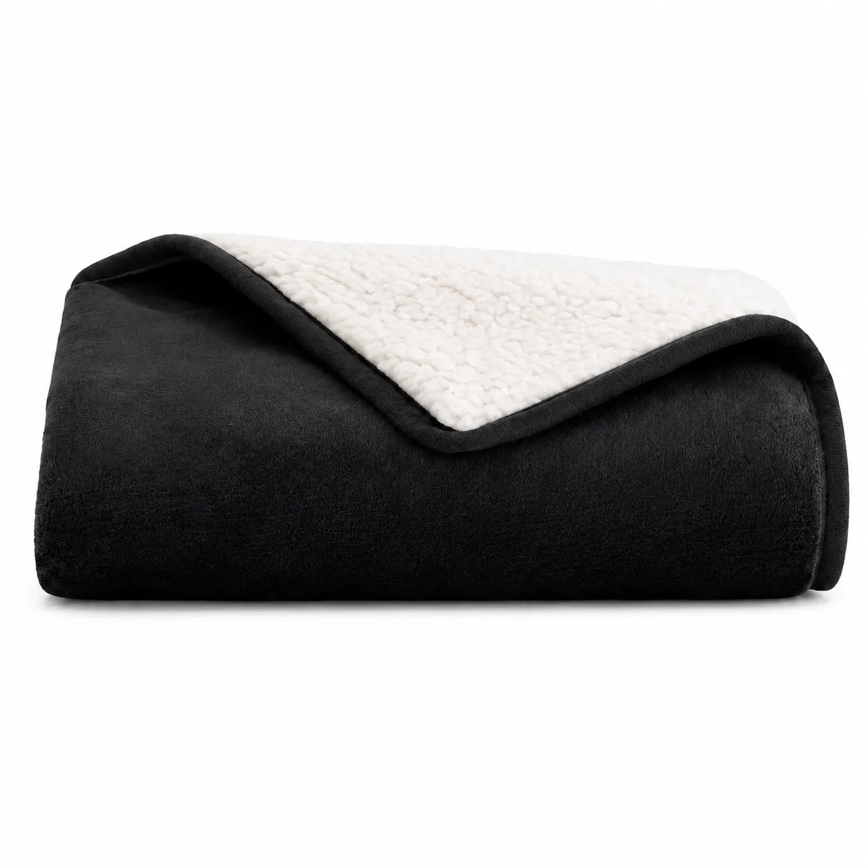 Folded black and white blanket on a white background