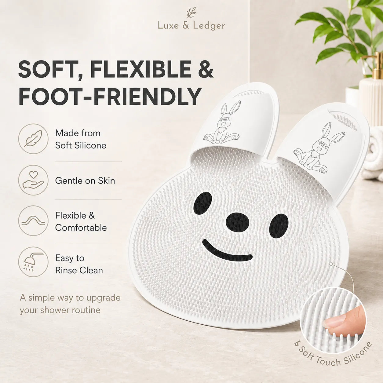White silicone bath mat with smiley face design on a light background, featuring Luxe & Ledger branding.