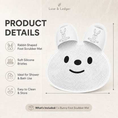 White rabbit-shaped foot scrubber mat with smiley face design on a beige background, featuring Luxe & Ledger branding.