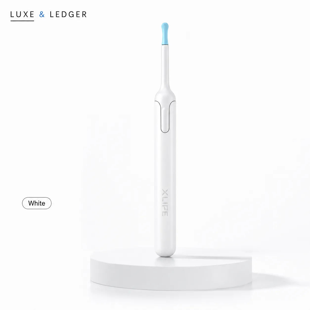 White electric toothbrush with blue accent on a white background, branded 'LUXE & LEDGER'.