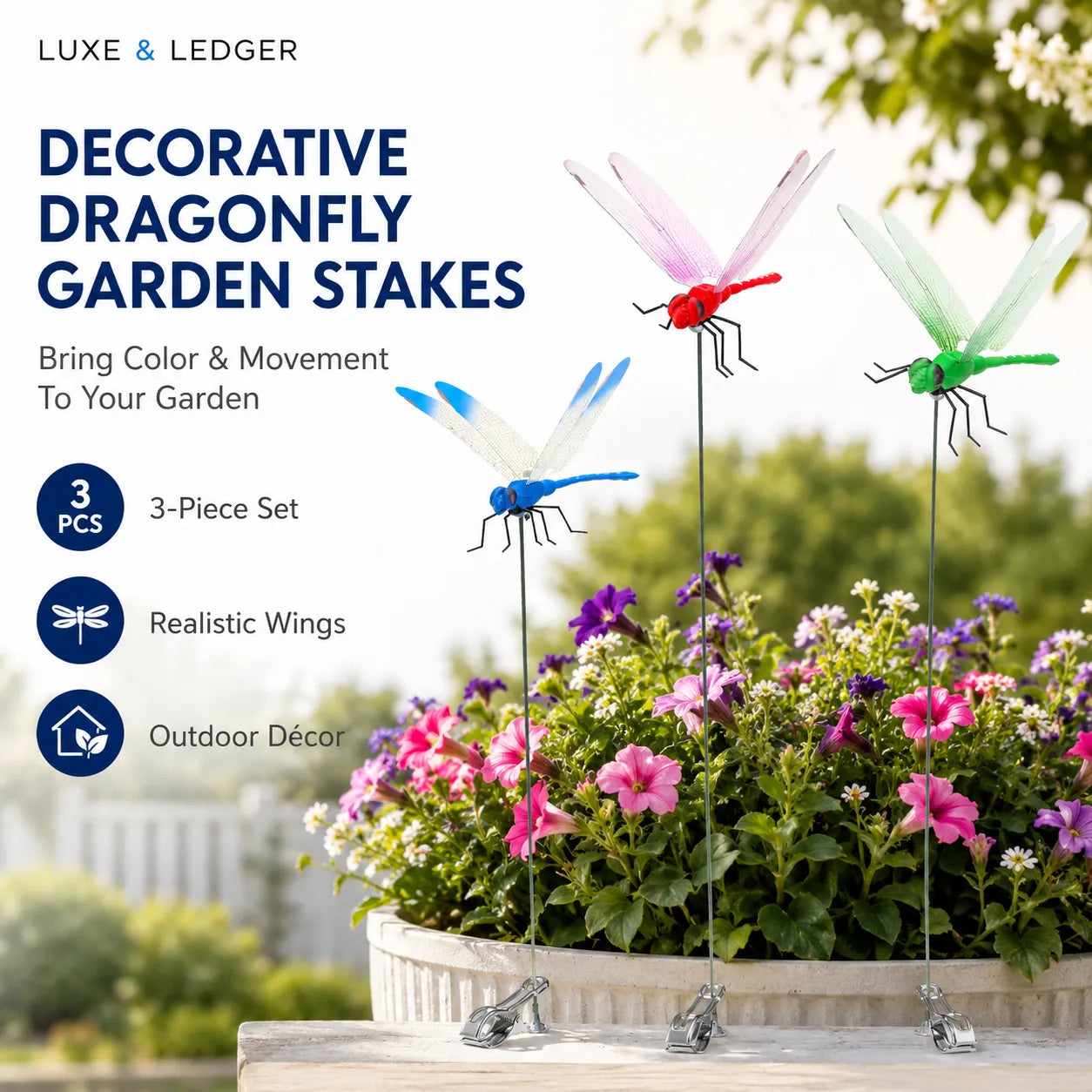 Decorative dragonfly garden stakes with realistic wings in a garden setting, featuring Luxe & Ledger branding.