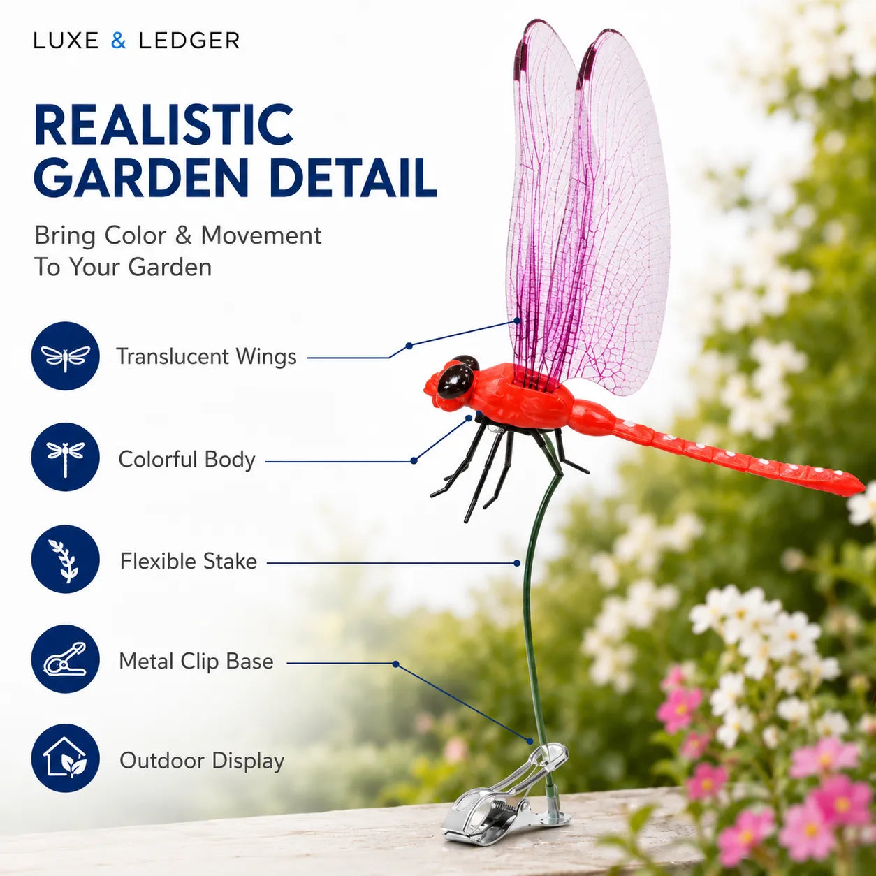 Red dragonfly decorative garden stake with features highlighted on a blurred garden background.