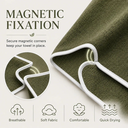 Green towel with white magnetic corners on a light gray background, featuring text about magnetic fixation and towel properties.