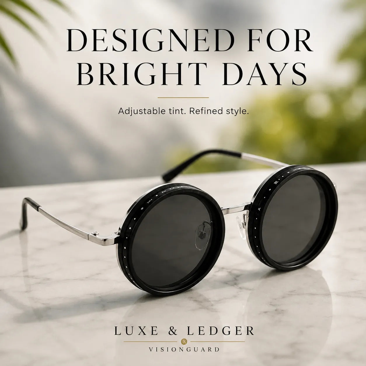 Round sunglasses with black lenses on a marble surface, branded 'Luxe & Ledger'.
