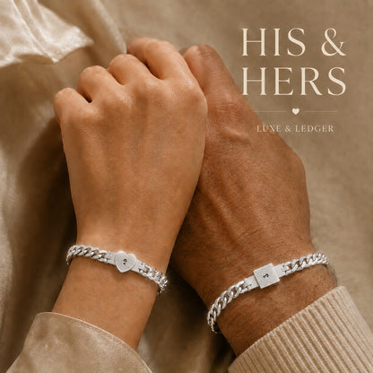 Two hands holding each other wearing matching silver bracelets with 'HIS & HERS' text above.