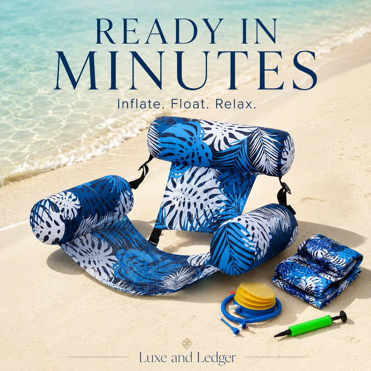 Blue inflatable lounge chair with accessories on a sandy beach
