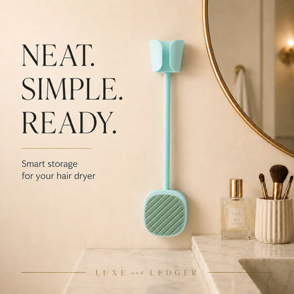 Hair dryer holder on a bathroom wall with text 'NEAT. SIMPLE. READY.' and brand name 'LUXE AND LEDGER'.