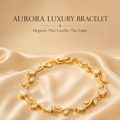 Gold bracelet with diamonds on a beige fabric background, labeled 'Aurora Luxury Bracelet'.
