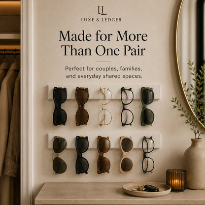 Wall-mounted eyewear organizer with sunglasses and glasses, featuring Luxe & Ledger branding.