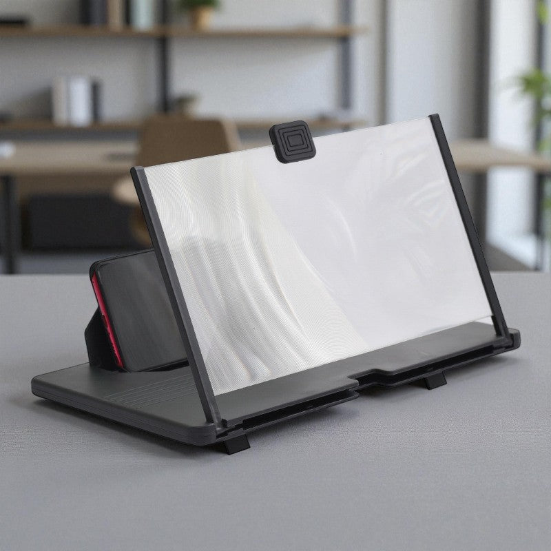Black phone screen magnifier  on a gray surface in an office setting