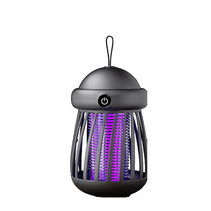 A dark gray electric bug zapper lantern with a hanging loop, featuring a power button on the upper section and glowing purple insect-catching grids inside, shown against a plain white background.