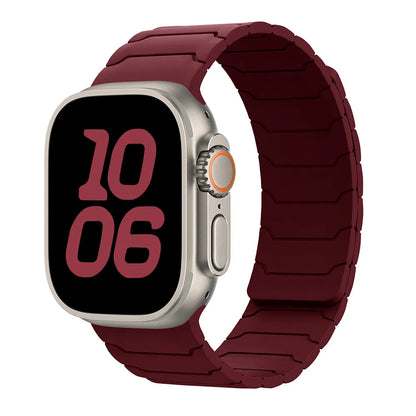 Smartwatch with a maroon band on a white background
