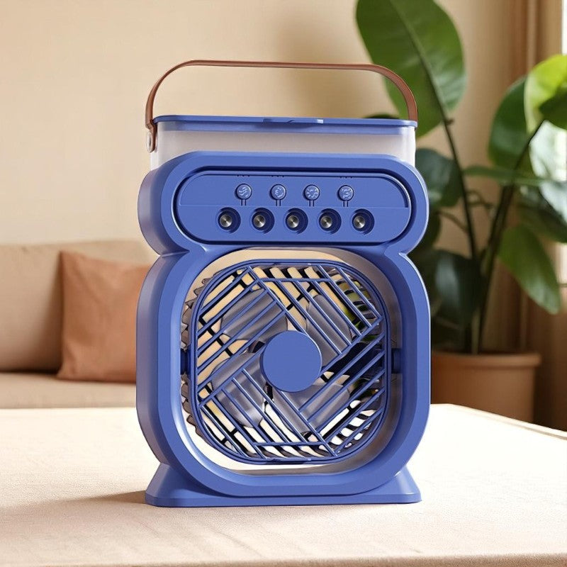 Blue portable fan on a table with a plant and sofa in the background