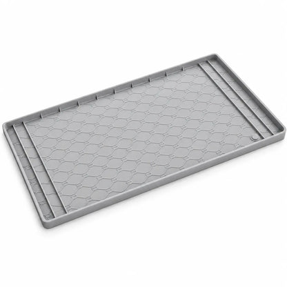 A gray rectangular plastic tray with a textured honeycomb pattern and raised ridges along the edges, shown on a clean white background.