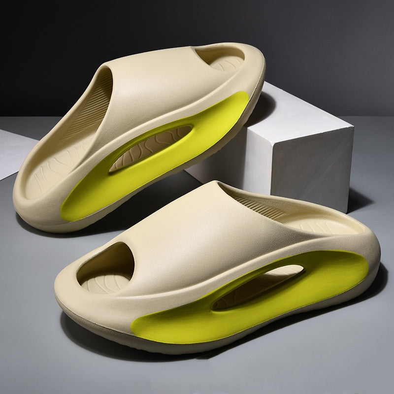 A single black and white summer slide with a sleek resistant design, placed against a patterned background with text highlighting 'GREAT GRIP FOR ANY SCENARIO' and 'SLICK RESISTANT DESIGN'.