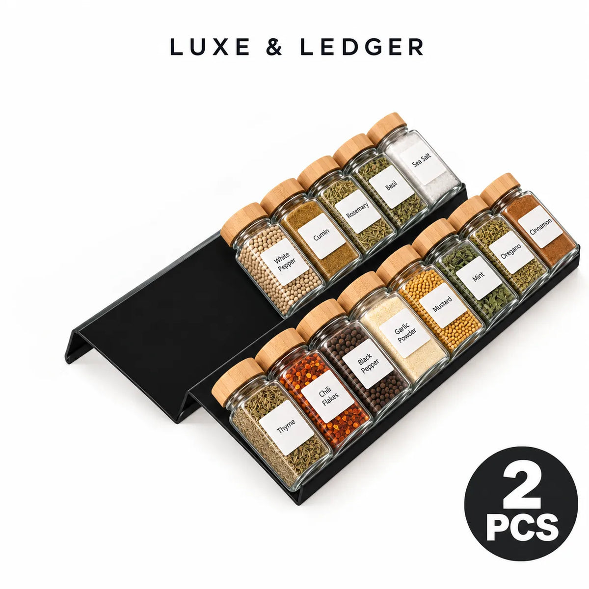 A black plastic spice rack holding twelve clear glass spice jars with light wood lids, shown on a white background with the text 'LUXE & LEDGER' at the top and a '2 PCS' badge at the bottom right.