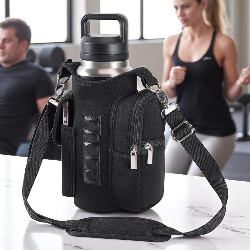 Black crossbody bag with water bottle holder on a marble surface, with people in the background.