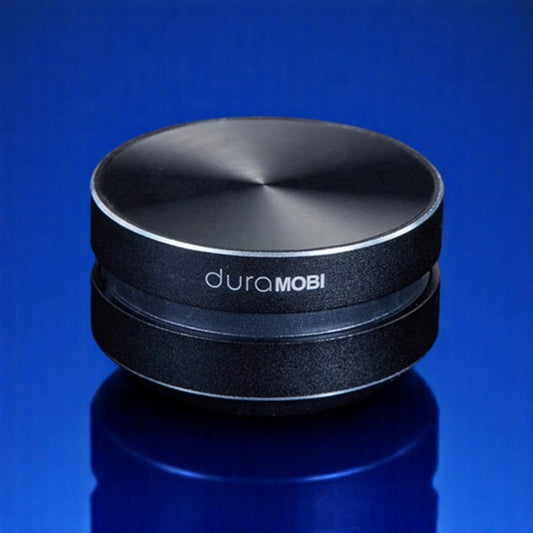 A compact and sleek black mini bone conduction speaker with the brand name 'DURAMOBI' visible on the top surface.