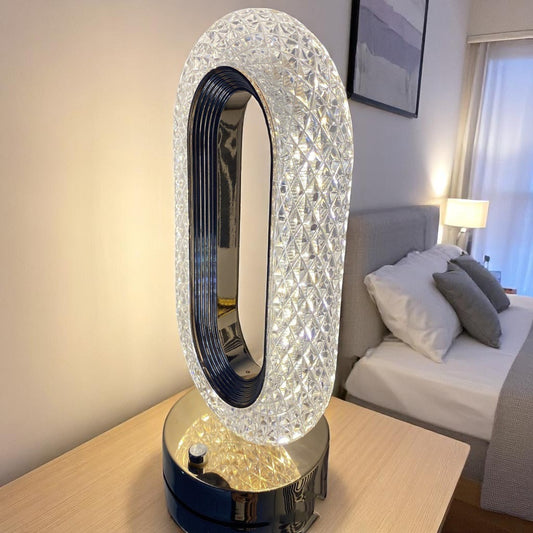 Decorative lamp with crystal design on a table in a bedroom setting