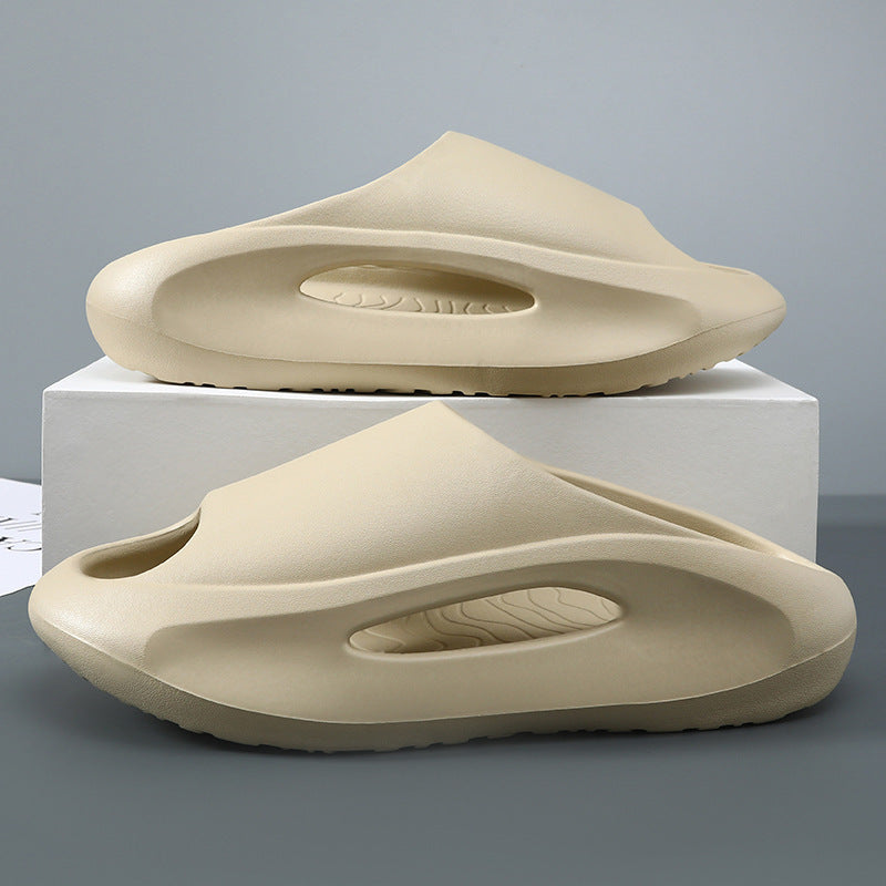A single black and white summer slide with a sleek resistant design, placed against a patterned background with text highlighting 'GREAT GRIP FOR ANY SCENARIO' and 'SLICK RESISTANT DESIGN'.
