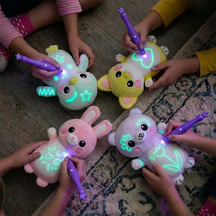 Children playing with glowing plush toys on a wooden floor.