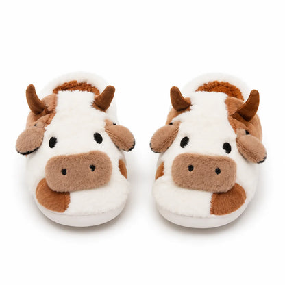 A pair of plush cow-face slippers in white and brown, shown from the front on a clean white background.