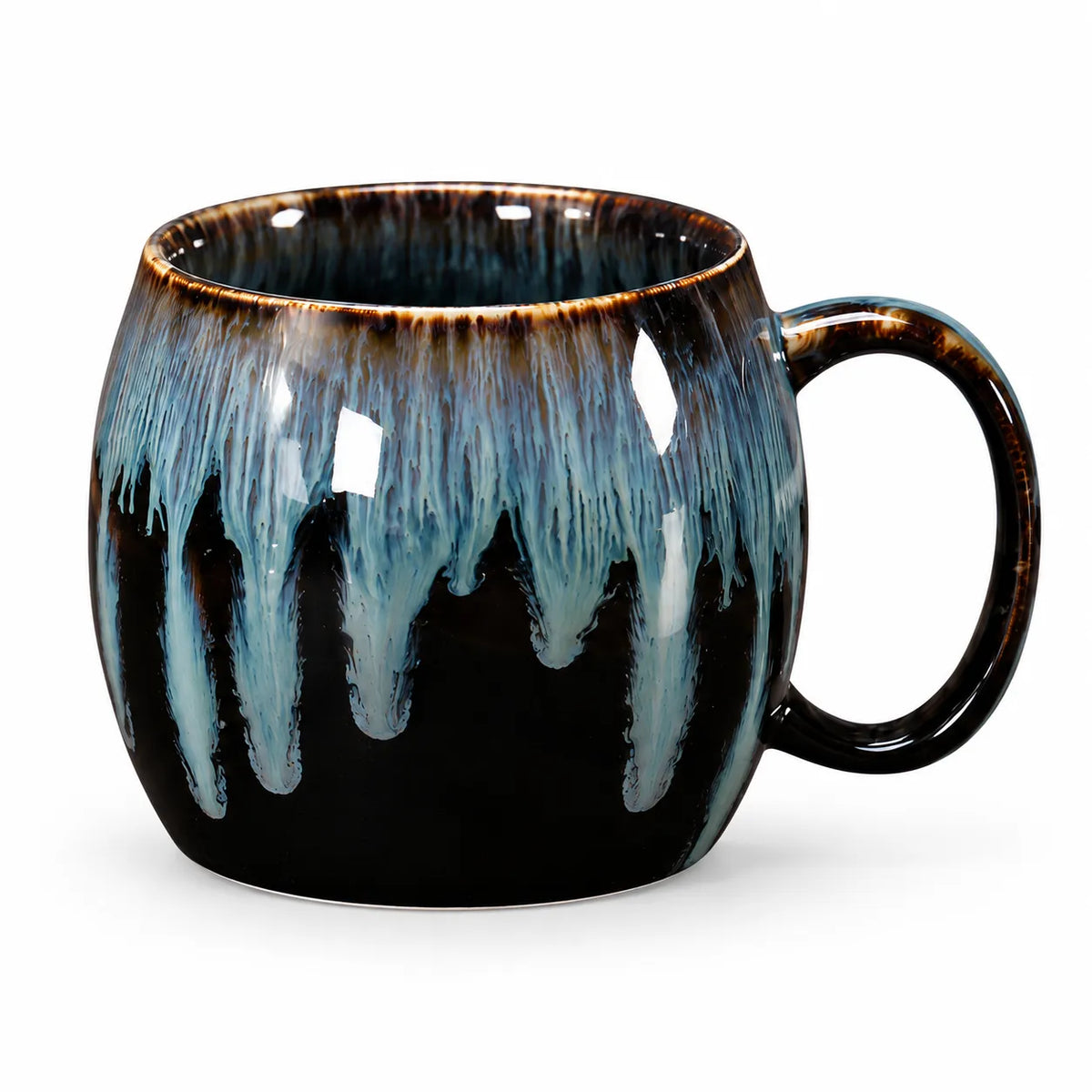 A ceramic mug with a glossy black base and a dripping glaze effect in light blue and dark brown, shown on a white background.