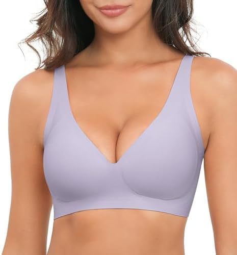 Woman wearing a light purple bra on a white background