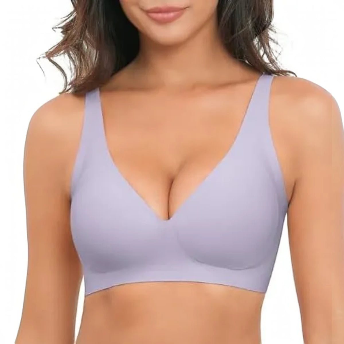 A woman wearing a light lavender wireless bralette with a deep V-neckline, shown from the chest up against a plain white background.